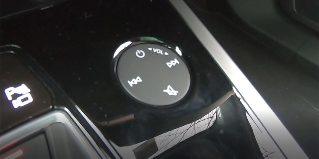 The radio is controlled by a touchpad interface.