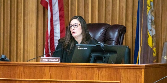 Judge presides from the bench