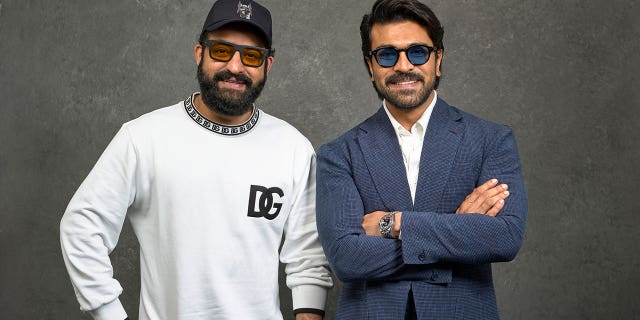 Indian actors N. T. Rama Rao Jr., left, and Ram Charan pose for a photo to promote "RRR" on Jan. 9, 2023, in Los Angeles. 