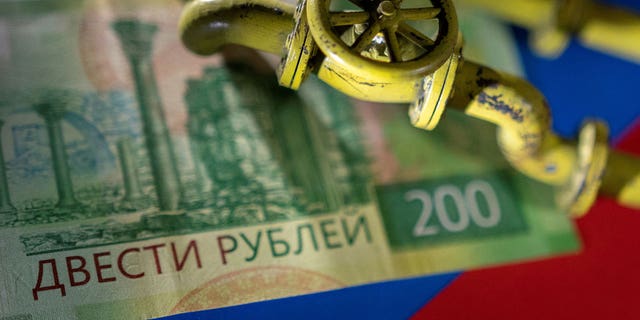 Strategic moves by Russia to address its budget deficit may inadvertently devalue the ruble, analysts warn.