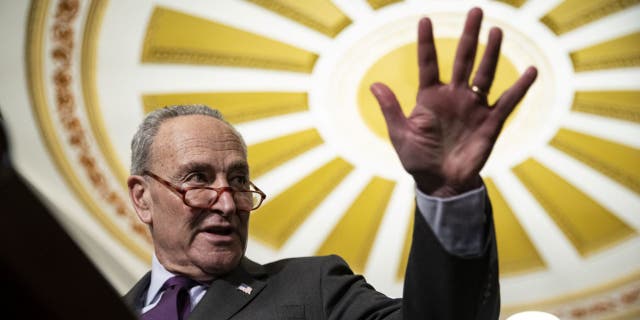 Senate Majority Leader Chuck Schumer is one of many Democrats warning of economic ruin because of the GOP push to negotiate spending cuts as part of a debt ceiling increase. (Al Drago/Bloomberg via Getty Images)