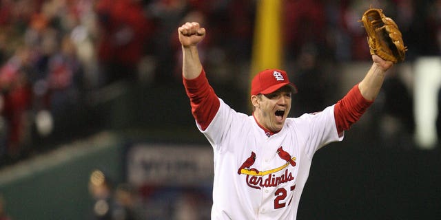 Scott Rolen of the St. Louis Cardinals celebrates a cap after Game 5 of the 2006 World Series on October 27, 2006 at Busch Stadium in St. Louis, Missouri.  The Cardinals defeated the Tigers 4-2.  