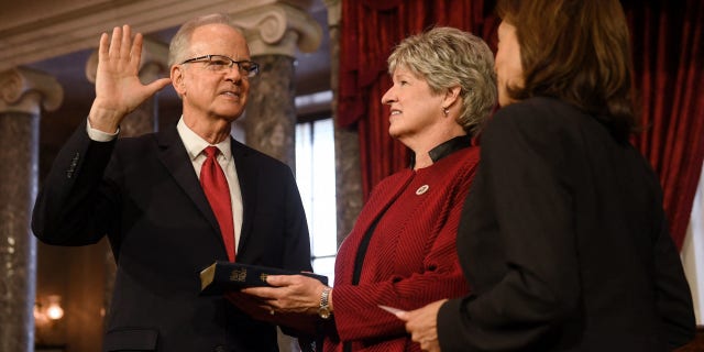 Vice President Kamala Harris ceremonially swears in Sen. Jerry Moran, Republican of Kansas, for the 118th Congress in the Old Senate Chamber at the U.S. Capitol in Washington, D.C., Jan. 3, 2023.