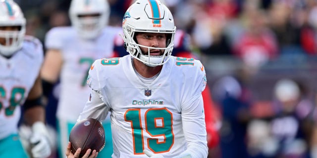 Skylar Thompson of the Miami Dolphins takes on the New England Patriots at Gillette Stadium on January 1, 2023 in Foxborough, Massachusetts.