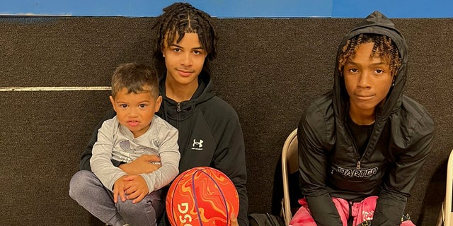 Having a toddler around brings out another side of the "guys," Josh Czerski told Fox News Digital. Daniel is pictured on the left and sitting on the lap of Cayne Woodland, 16. Josiah Legree, 16, sits on the right.