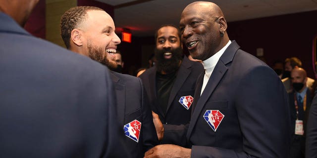 Steph Curry and Michael Jordan laughing