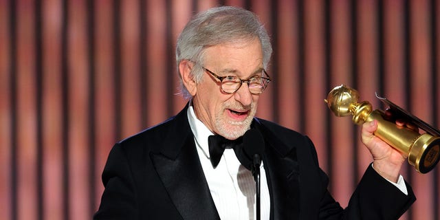 Steven Spielberg accepts the Best Director award 