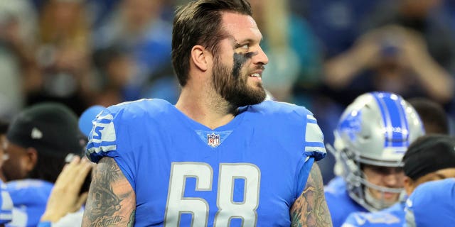 Detroit Lions offensive tackle Taylor Decker (68) walks across the field before a game against the Jacksonville Jaguars in Detroit on December 4, 2022. 