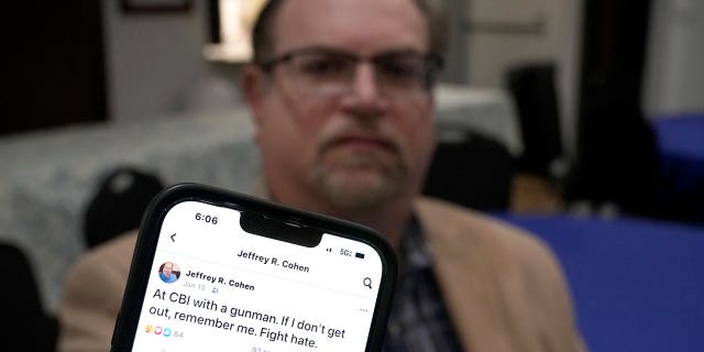 Jeff Cohen, one of four hostages in the 2022 attack on the Congregation Beth Israel synagogue near Fort Worth, shows a Facebook post he left under duress that warned his friends about the incident.
