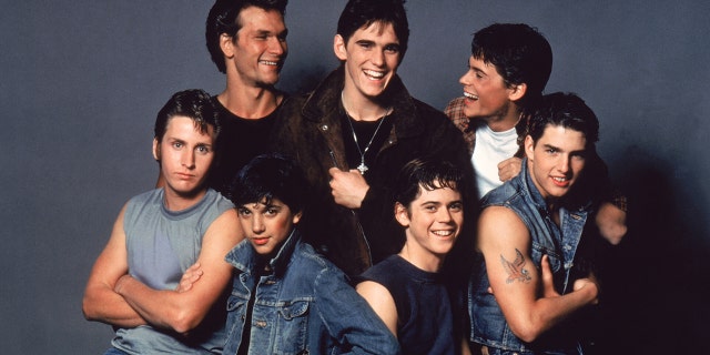 American actors Patrick Swayze, Matt Dillon, Rob Lowe, Emilio Estevez, Ralph Macchio, Thomas C. Howell and Tom Cruise on the set of "The Outsiders," directed by Francis Ford Coppola. 