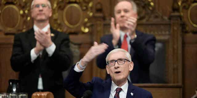 Gov. Tony Evers speaks during the annual State of the State address on Jan. 24, 2023, in Madison, Wisconsin. Evers wants to allocate 20% of the sales tax revenue in Michigan to help fund local communities. He also wants to cut taxes in the state.