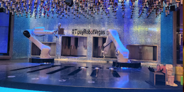 The general manager of "Tipsy Robot" In Las Vegas said the automatic 10% service charge is disbursed among eight human employees working at the bar.