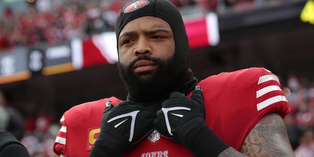 Trent Williams #71 of the San Francisco 49ers on the sideline before the game against the Arizona Cardinals at Levi's Stadium on January 8, 2023 in Santa Clara, California.  The 49ers defeated the Cardinals 38-13.