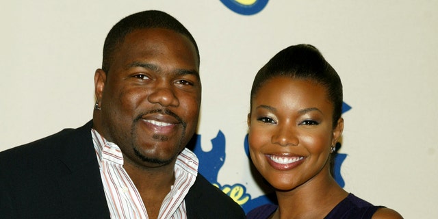 Actress Gabrielle Union and husband Chris Howard arrive at the 2004 Spike TV Video Game Awards at Barker Hanger Dec. 14, 2004, in Santa Monica, Calif.  