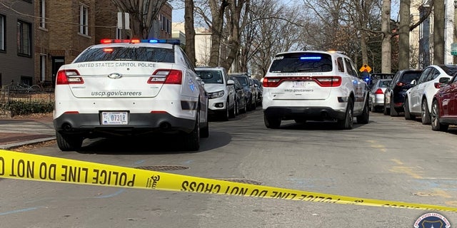 U.S. Capitol Police vehicles at the scene where two suspected armed carjackers were arrested following a short car chase in Washington D.C. 
