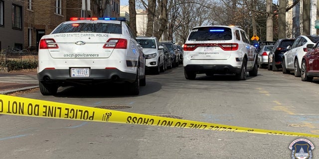 U.S. Capitol Police vehicles at the scene where two suspected armed carjackers were arrested following a short car chase in Washington D.C.