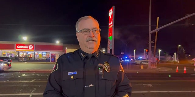 Yakima Police Chief Matt Murray briefed reporters outside the Circle K where three people were killed early Tuesday.