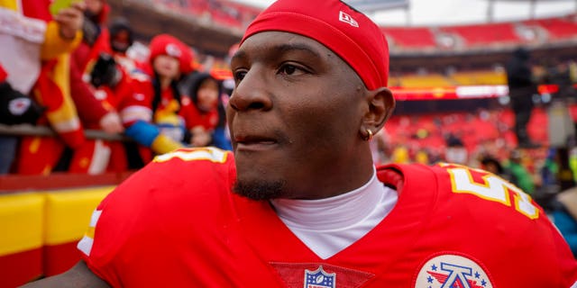 Willie Gay #50 of the Kansas City Chiefs throws his gloves to fans after the 24-10 victory over the Seattle Seahawks at Arrowhead Stadium on December 24, 2022 in Kansas City, Missouri.