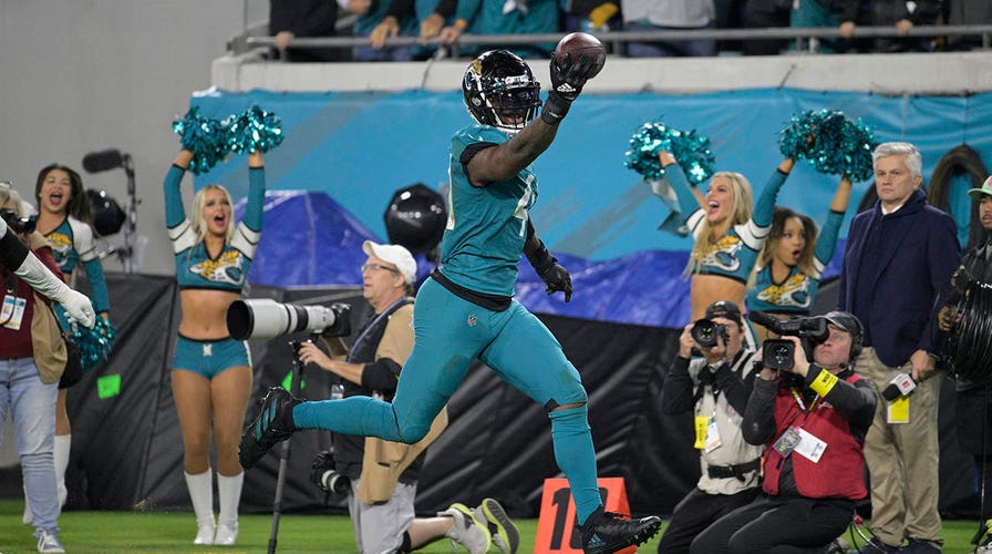 Jaguars clinch division title after Titans crumble, defense bails out  Lawrence