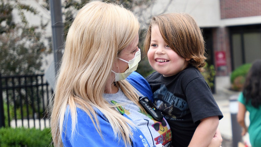 Beckett Culp with Riley Children's Hospital Life Specialist Maddie Rodriguez