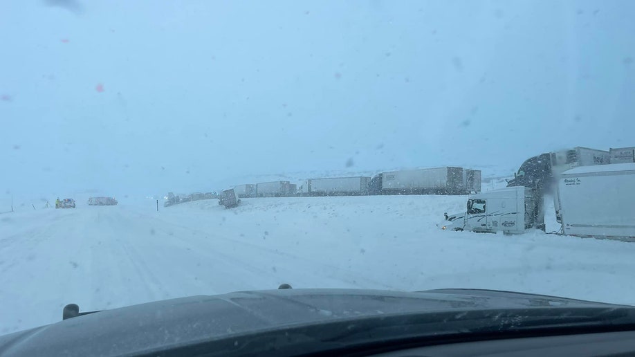 trucks on side of road