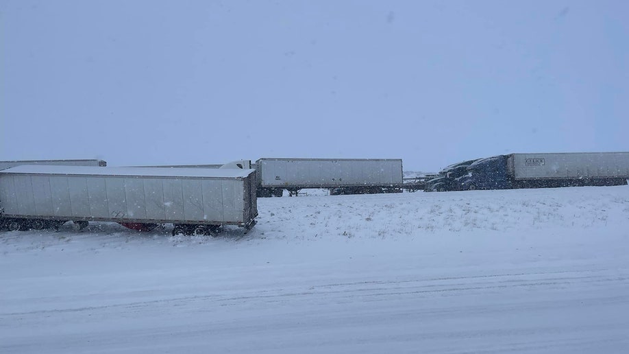 trucks on snowy road 