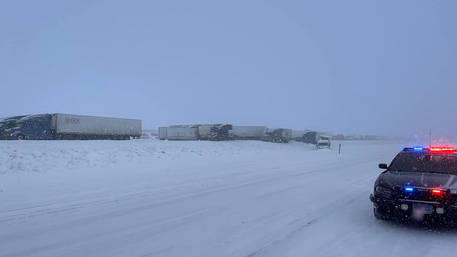 trucks on snowy road 