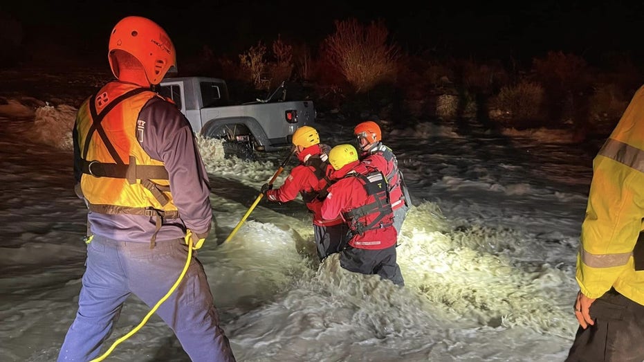 California crews rescue family from SUV engulfed by raging floodwaters