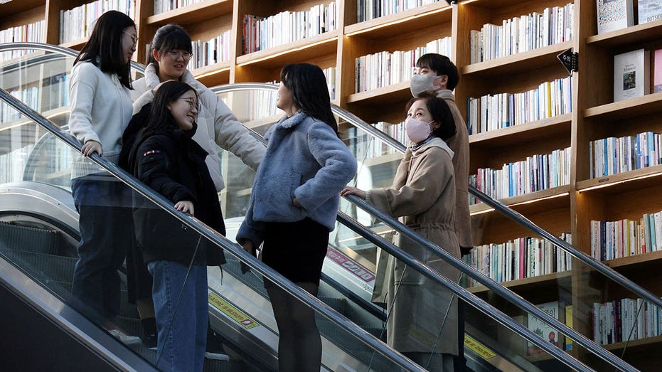 South Korea drops indoor mask mandate, but many continue to wear them as concerns linger