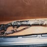 An evidence photo of a rifle.
