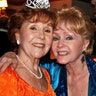 Margie Duncan and Debbie Reynolds embracing each other in the later years