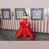 Lily James in a red dress