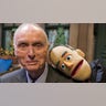 Lloyd Morrisett with a muppet