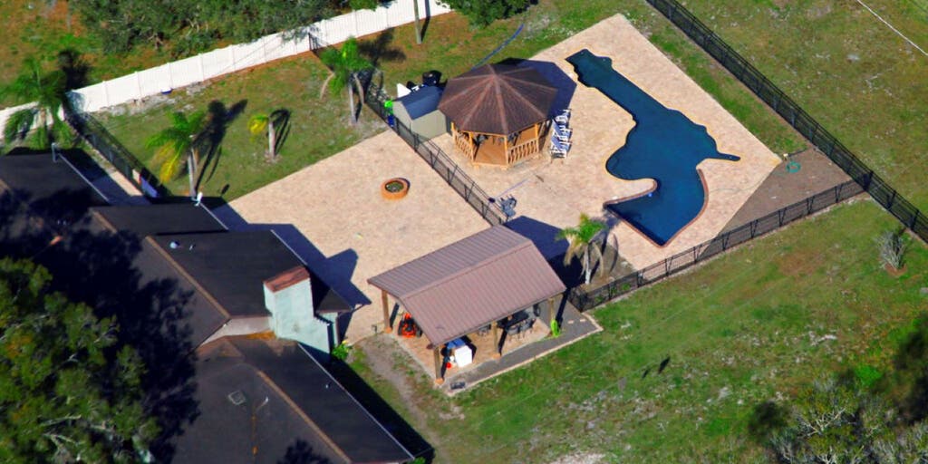 Florida couple shows off backyard pool shaped like revolver: 'You swim your lap down the barrel' - Vimarsana News