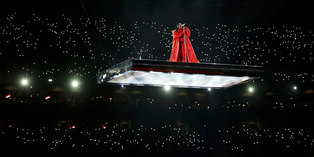 Rihanna dazzles from above at Super Bowl halftime show - CBS News