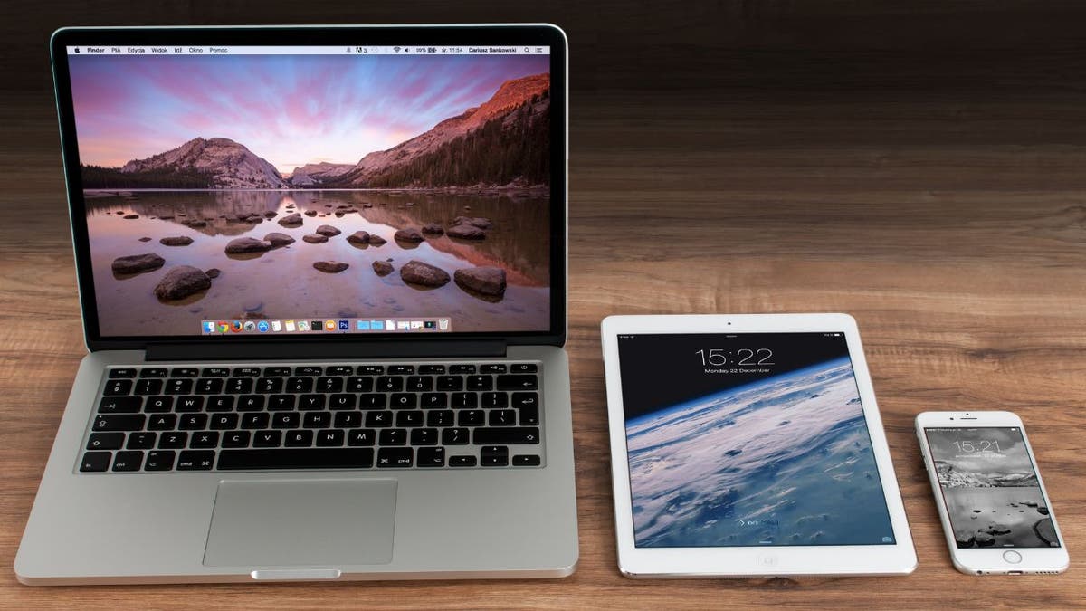 Apple macbook pro and iPad on a desk 