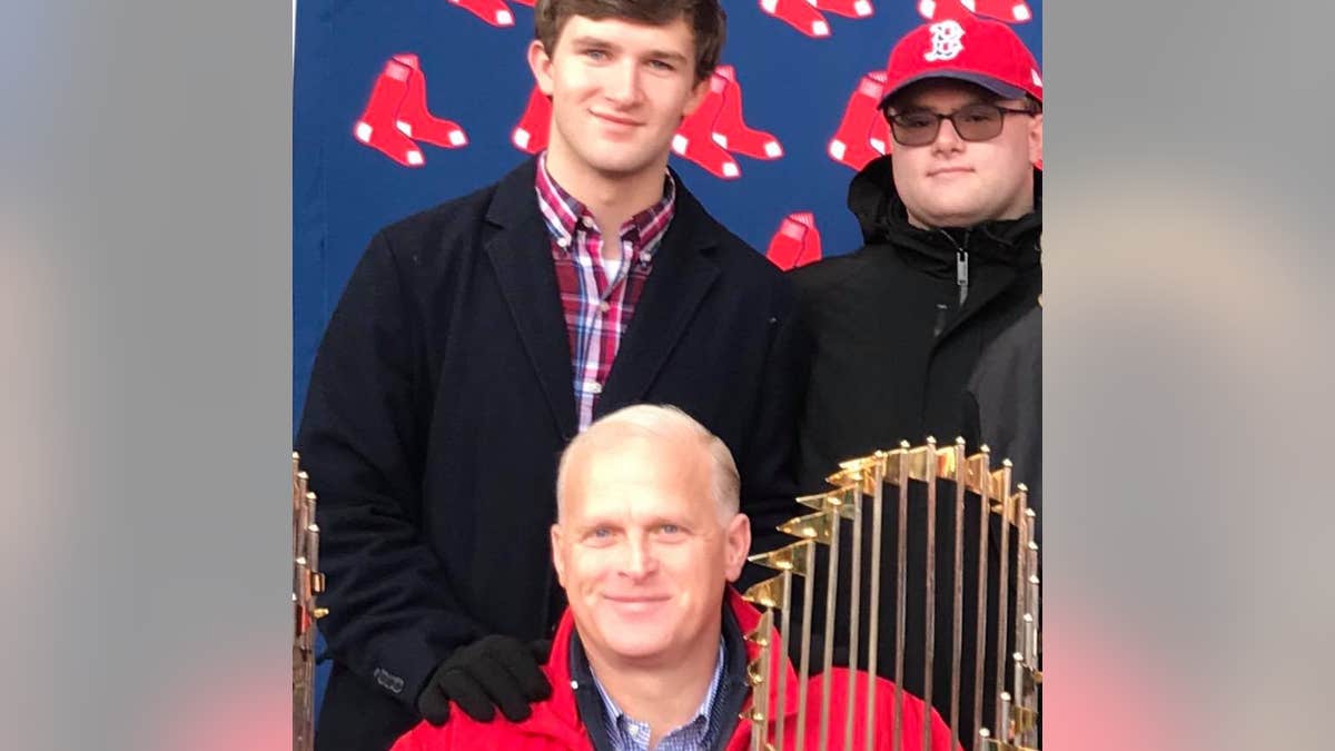 Jon Fetherston poses with his sons Andrew and Nicholas