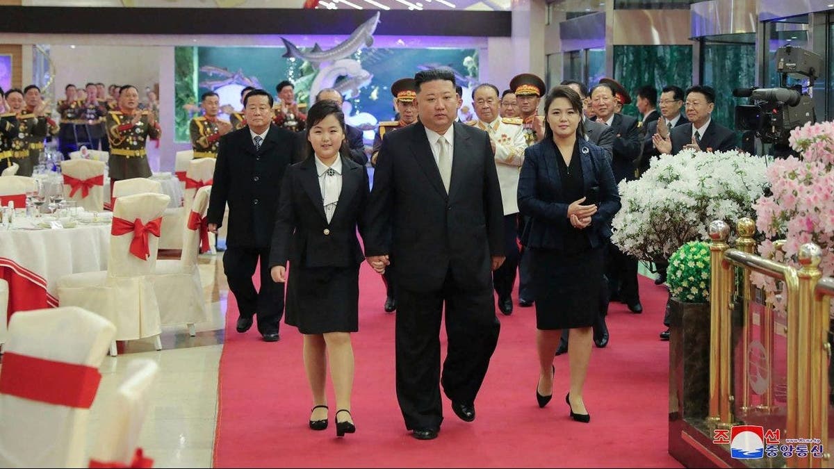 Kim Jong Un with wife and daughter