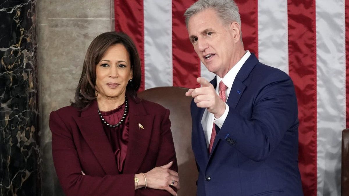 Vice President Kamala Harris talks with House Speaker Kevin McCarthy