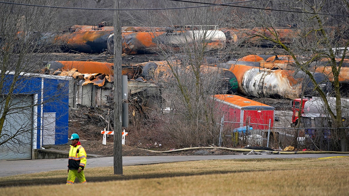 The cleanup of portions of a Norfolk Southern freight train that derailed Friday night in East Palestine, Ohio, continues on Thursday, Feb. 9, 2023. (AP Photo/Gene J. Puskar)