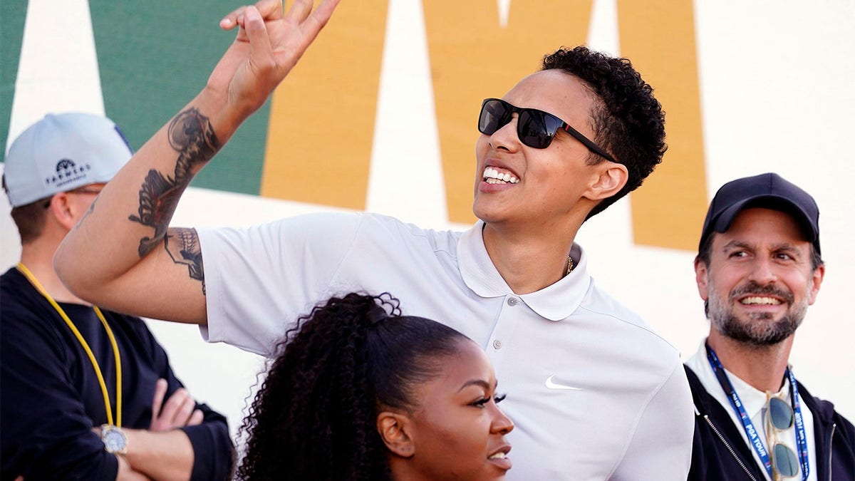 Brittney Griner waves to the crowd at the Phoenix Open