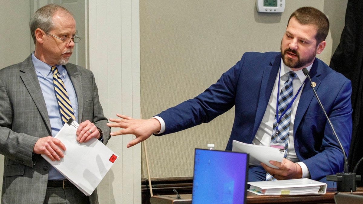 Prosecutor Creighton Waters, left, questions South Carolina Law Enforcement Division special agent Peter Rudofski