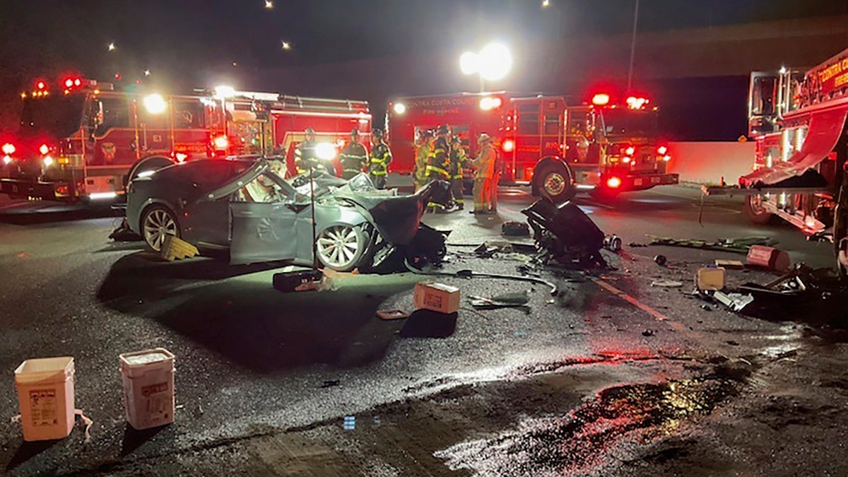 Tesla crashes into fire truck