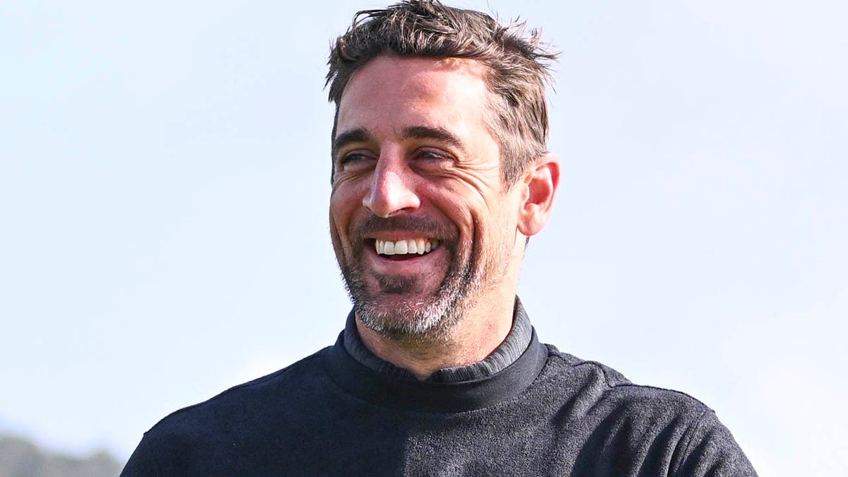 Aaron Rodgers plays golf