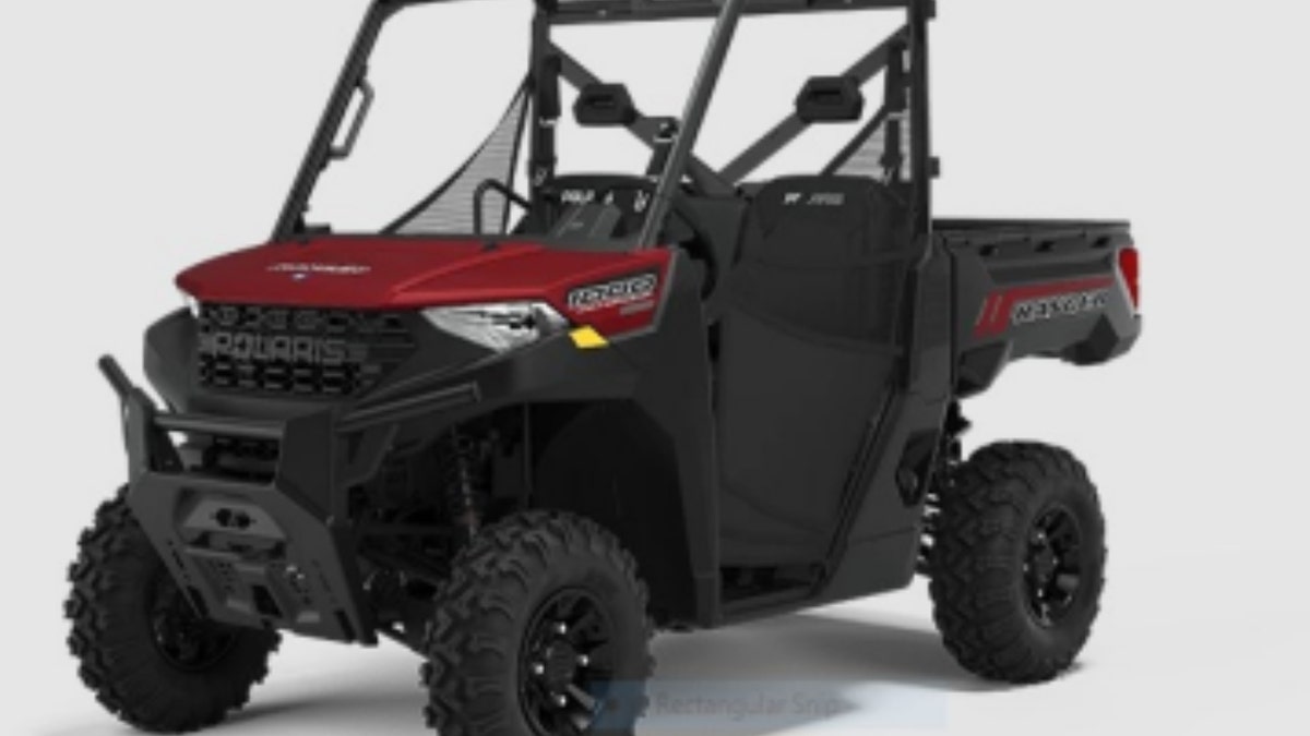 Maroon and black Polaris Northstar XP 1000 golf cart