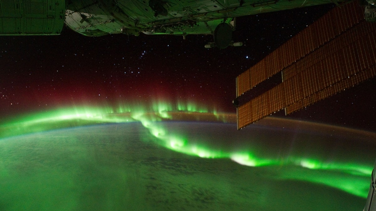 Auroral beads seen from the International Space Station