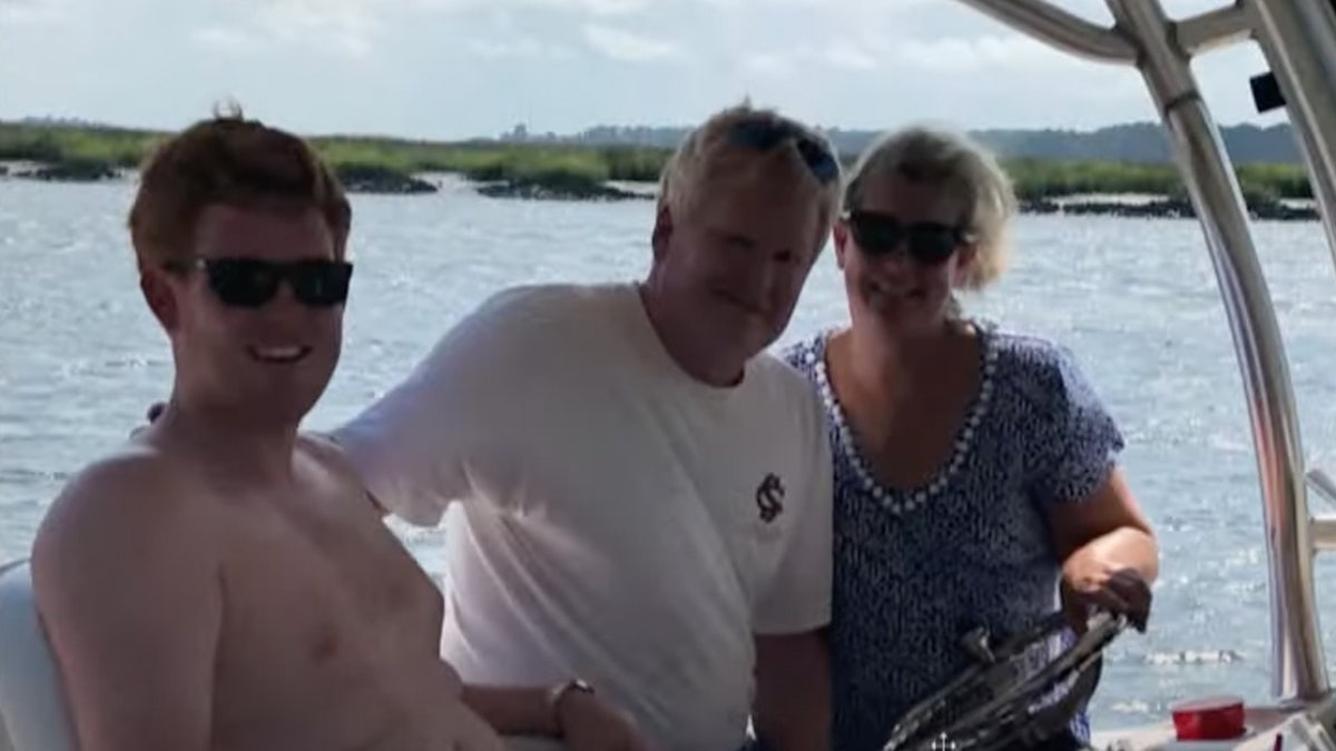 buster, Alex and Maggie Murdaugh on a boat.