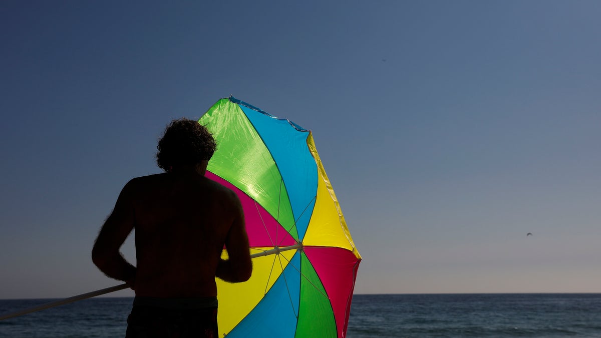 man at CA beach