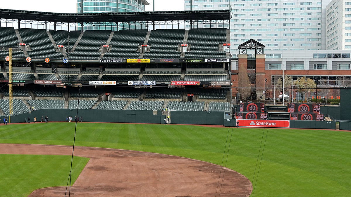 Orioles remove iconic Baltimore Sun sign from Camden Yards scoreboard
