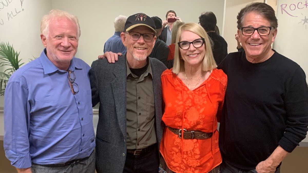 Don Most, Ron Howard with Anson Williams' fiancee and Anson Williams smiling